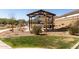 Community picnic area with shady gazebo offers residents a comfortable outdoor space for gatherings and relaxation at 4488 W Charlie Dr, San Tan Valley, AZ 85144