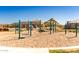 Community playground with climbing structures, providing an engaging outdoor space for active play at 4488 W Charlie Dr, San Tan Valley, AZ 85144