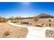 Scenic community walking path with resting bench offers residents a tranquil space for exercise and relaxation at 4488 W Charlie Dr, San Tan Valley, AZ 85144