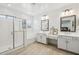 Elegant bathroom with double vanity, soaking tub, and walk-in shower at 634 E Deer Creek Rd, Phoenix, AZ 85048