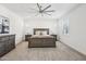 Bright bedroom featuring a king-size bed and large windows at 634 E Deer Creek Rd, Phoenix, AZ 85048