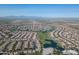 Aerial view of community with golf course and lake at 9510 E Jadecrest Dr, Sun Lakes, AZ 85248