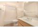 Clean bathroom, shower/tub combo and light wood vanity at 9510 E Jadecrest Dr, Sun Lakes, AZ 85248