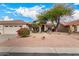 Single-story home with desert landscaping and two-car garage at 9510 E Jadecrest Dr, Sun Lakes, AZ 85248