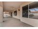 Covered patio with ceiling fan and sliding glass doors at 9510 E Jadecrest Dr, Sun Lakes, AZ 85248