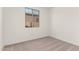 This bedroom has neutral carpet and a window providing natural light at 18544 E Dario Rd, Gold Canyon, AZ 85118