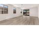 Bright and airy living area with modern flooring and sliding glass doors at 18544 E Dario Rd, Gold Canyon, AZ 85118