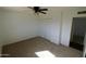 Spacious bedroom with ceiling fan and large closet at 1915 E Palmcroft Dr, Tempe, AZ 85282