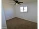 Bright bedroom with neutral walls and carpet at 1915 E Palmcroft Dr, Tempe, AZ 85282