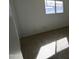 Simple bedroom with carpet flooring and window at 1915 E Palmcroft Dr, Tempe, AZ 85282