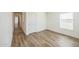 Bedroom with wood flooring and plenty of light with views to the outside at 41735 N 260Th Ave, Morristown, AZ 85342