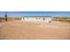 Aerial view of property in the desert with native plants and blue sky at 41735 N 260Th Ave, Morristown, AZ 85342