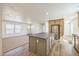 Open kitchen with stainless steel appliances and a center island, perfect for modern living at 41735 N 260Th Ave, Morristown, AZ 85342