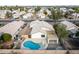 Aerial view showing home, pool, and surrounding neighborhood at 8549 W El Caminito Dr, Peoria, AZ 85345