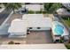 Home with pool and desert landscaping, aerial view at 8549 W El Caminito Dr, Peoria, AZ 85345