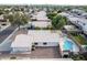 Aerial view of home with a backyard pool and patio at 8549 W El Caminito Dr, Peoria, AZ 85345