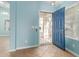 Interior entryway with blue walls and tile floor at 8549 W El Caminito Dr, Peoria, AZ 85345