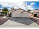 Two-car garage home curb appeal at 8549 W El Caminito Dr, Peoria, AZ 85345