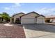 Two-car garage and attractive curb appeal at 8549 W El Caminito Dr, Peoria, AZ 85345