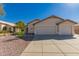 Charming single-story home with a two-car garage and low-maintenance desert landscaping at 8549 W El Caminito Dr, Peoria, AZ 85345