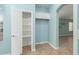 Walk-in pantry with white shelves and door at 8549 W El Caminito Dr, Peoria, AZ 85345