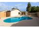 Blue kidney shaped pool at 8549 W El Caminito Dr, Peoria, AZ 85345