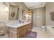 Bathroom with double vanity and a large mirror at 14 E 14Th St, Tempe, AZ 85281