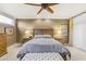 Main bedroom with gray bedding and wooden furniture at 14 E 14Th St, Tempe, AZ 85281