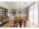 Formal dining room with hardwood floors, a large table, and built-in hutch at 14 E 14Th St, Tempe, AZ 85281