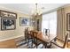 Elegant dining room with hardwood floors, large table, and chandelier at 14 E 14Th St, Tempe, AZ 85281