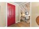 Red door entry with view of living room and hardwood floors at 14 E 14Th St, Tempe, AZ 85281