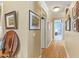 Bright hallway with hardwood floors and framed artwork at 14 E 14Th St, Tempe, AZ 85281