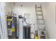 Utility room with water heater, water softener, and filtration system at 14 E 14Th St, Tempe, AZ 85281