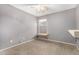 A simple bedroom offers a window shelf and neutral carpet at 15912 W Marconi Ave, Surprise, AZ 85374
