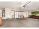 A spacious garage with storage, workbench, and ample space at 15912 W Marconi Ave, Surprise, AZ 85374