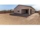 Backyard view showing an outdoor patio and ample space at 17586 W Blue Sky Dr, Surprise, AZ 85387