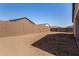 Backyard featuring a block wall for privacy, ready for personalization at 17586 W Blue Sky Dr, Surprise, AZ 85387