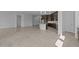 Spacious kitchen with dark wood cabinets, stainless appliances, and a central island at 21627 W Mariposa St, Buckeye, AZ 85396