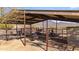 Well-maintained horse stable with feeding areas and mountain views at 41621 N 54Th St, Cave Creek, AZ 85331