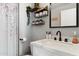 Clean bathroom with a white vanity and black fixtures at 4315 E Nancy Ln, Phoenix, AZ 85042