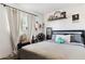 Main bedroom with a full bed and decorative accents at 4315 E Nancy Ln, Phoenix, AZ 85042