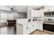 Kitchen with white cabinets and quartz countertops at 4315 E Nancy Ln, Phoenix, AZ 85042