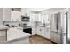 Modern white kitchen with stainless steel appliances at 4315 E Nancy Ln, Phoenix, AZ 85042