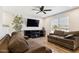 Living area with two sofas and wood flooring at 4315 E Nancy Ln, Phoenix, AZ 85042