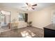 Cozy bedroom with carpeted floors and a dresser at 6255 E Ensenada St, Mesa, AZ 85205