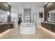 Modern bathroom with hexagon tile and a large soaking tub at 17213 E Morning Vista Ct, Rio Verde, AZ 85263