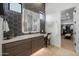 Bathroom boasts a hexagon tile feature wall, dual vanity, and access to a large closet at 17213 E Morning Vista Ct, Rio Verde, AZ 85263