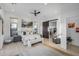 Bright and spacious main bedroom with a large window and sliding barn door at 17213 E Morning Vista Ct, Rio Verde, AZ 85263