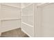 Walk in closet with shelving and hanging rods at 17709 W Southgate Ave, Goodyear, AZ 85338