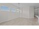 Bright dining room with modern light fixture and large windows at 19341 W San Juan Ave, Litchfield Park, AZ 85340